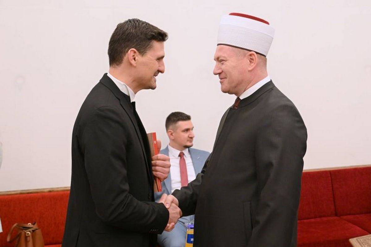 Evangeličanski škof Aleksander Erniša in mufti Nevzet Porić