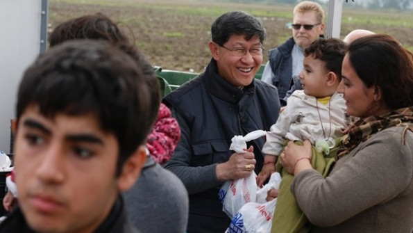 Kardinal Tagle med prebežniki