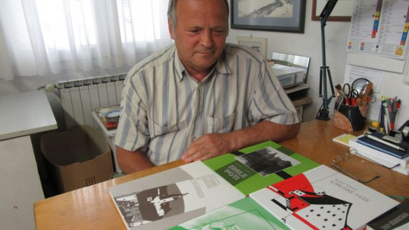 Rafko Rerpin ob svojih knjigah