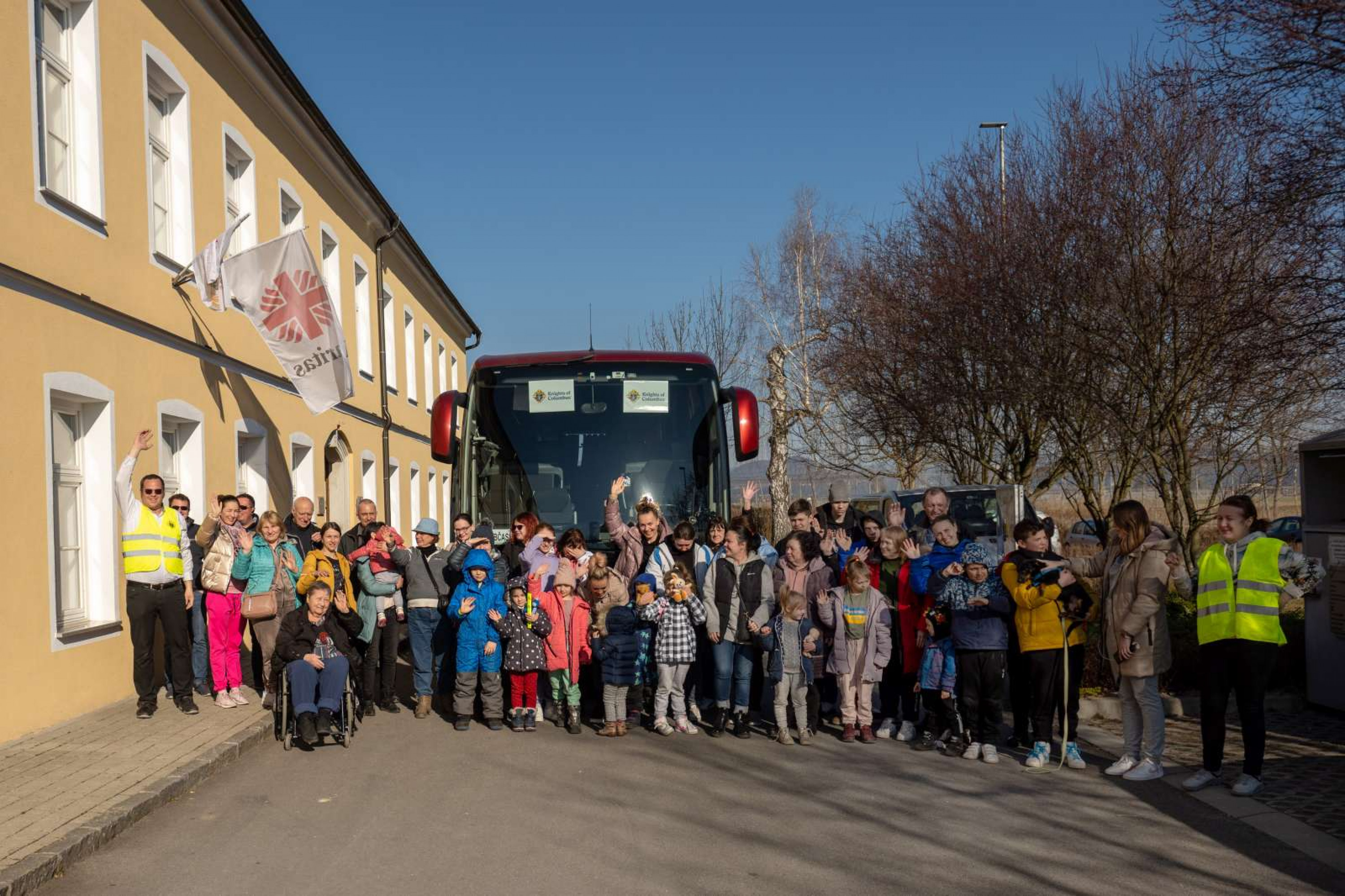 Skupinska fotografija beguncev, ki so 22.3.2022 organizirano prisli iz Lviva v Slovenijo.